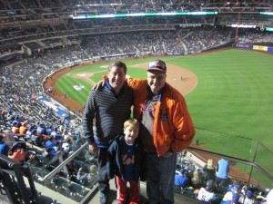 Justin Arnold knows how to dress for a Mets playoff game. He and his dad know how to bring their team luck, too.